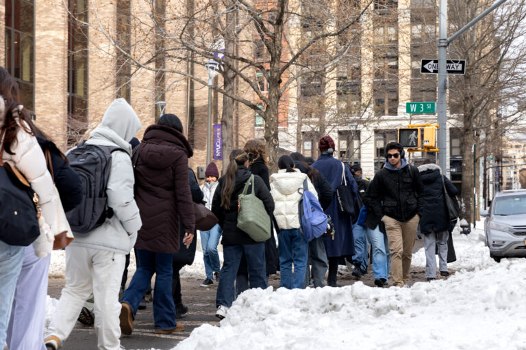 nyu students walking through the city.